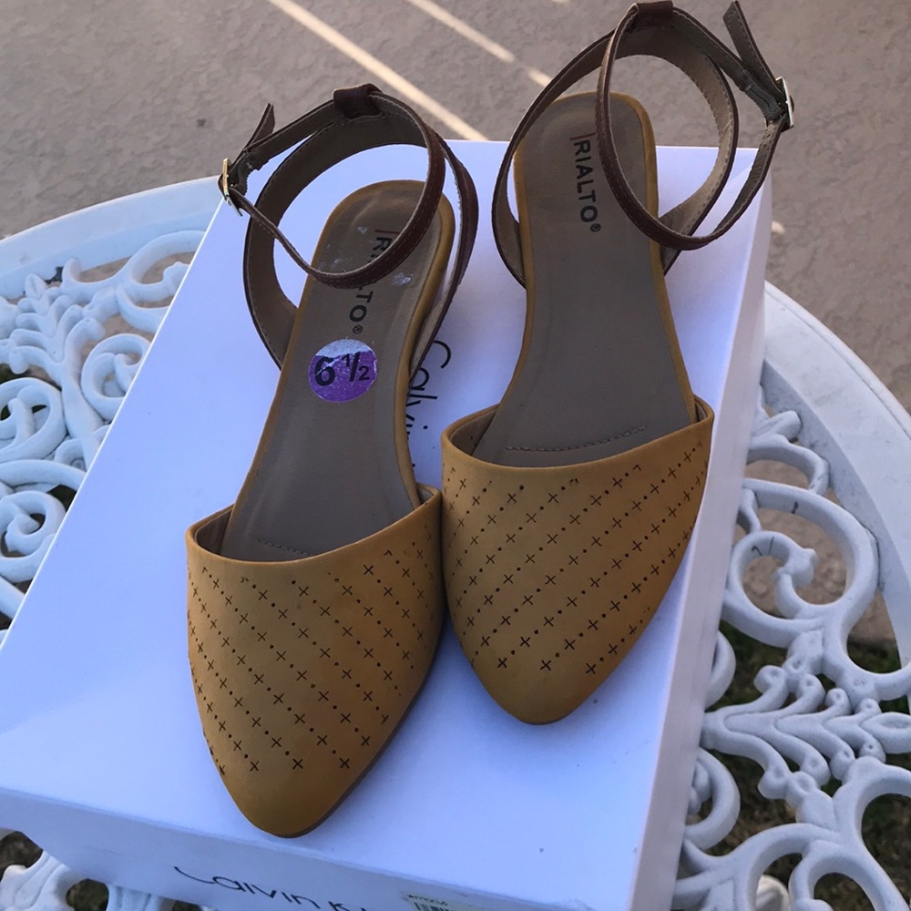 New condition wedge with back strap shoes.
